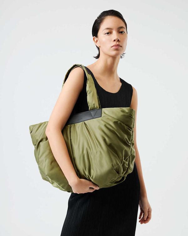 Ecofriendly tote bag crafted from sustainable materials, designed for durability and versatility. Ideal for moms, traveling, gym sessions, and work, offering practical style for everyday needs.