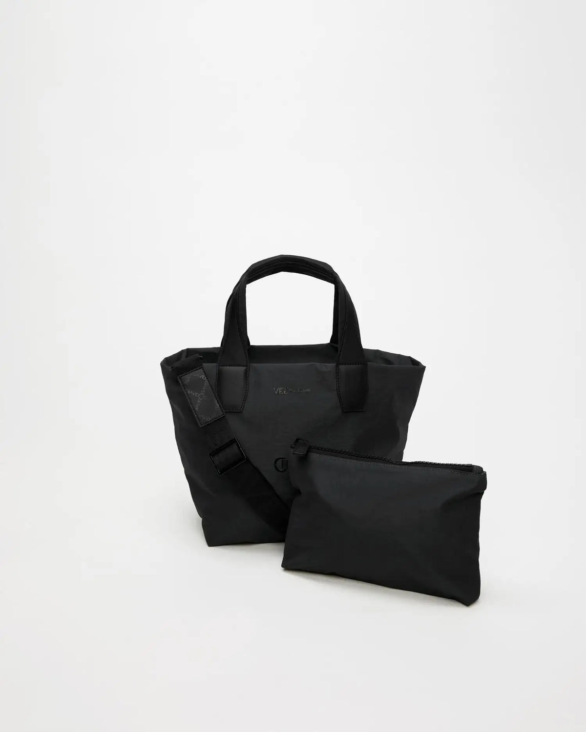 Porter Essence Small Black Paper bag made of sustainable paper touch nylon, featuring a minimalist design and practical compartments.