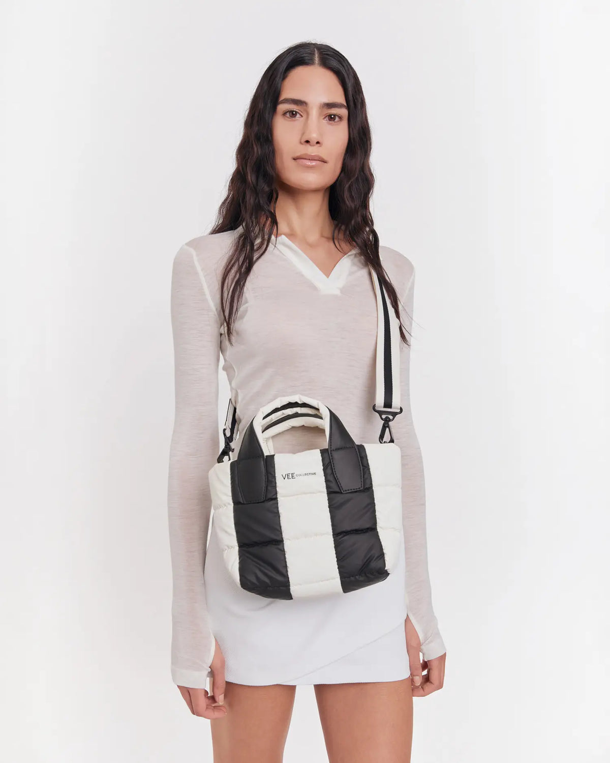 VEE Striped bag made from sustainable, waterproof materials, perfect for everyday use, concerts, and nights out. Stylish and practical, combining eco-friendly design with durability for versatile occasions."