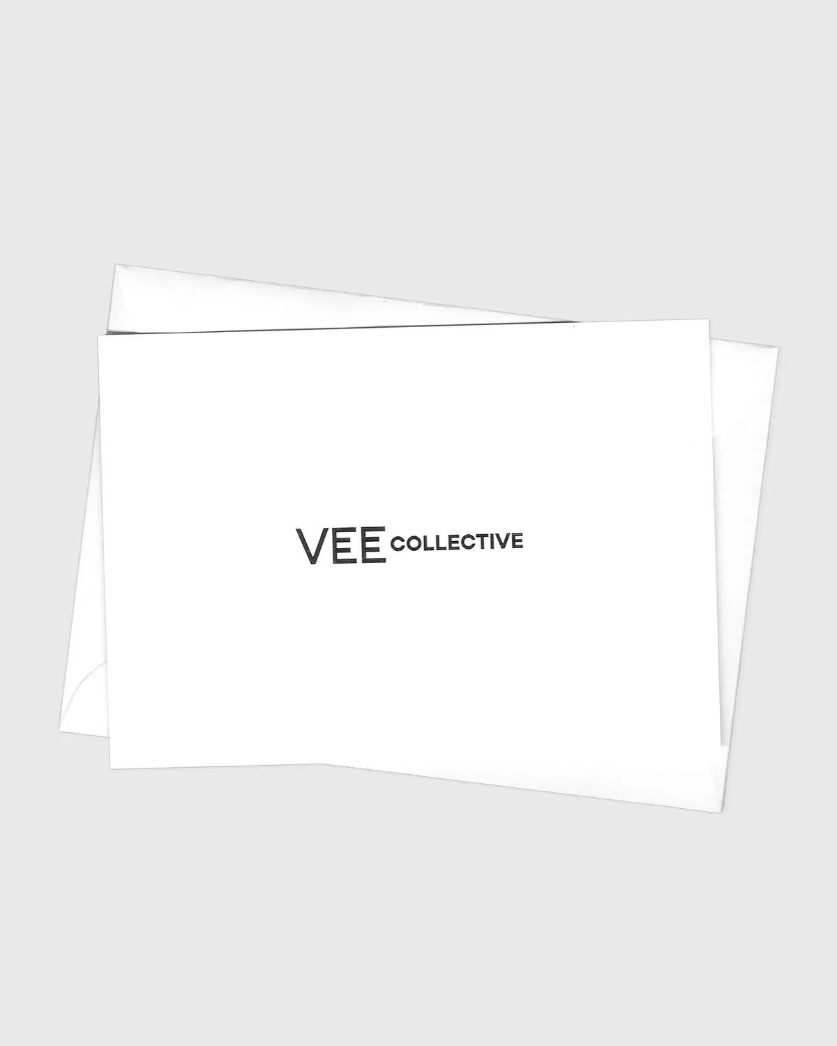 Minimalist card design showing the VEE Collective logo printed on a clean white background.