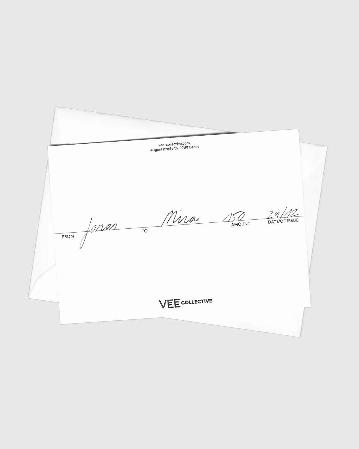 VEE Collective gift card with handwritten details showing a 150 value, addressed from Jonas to Mira, displayed with a white envelope.