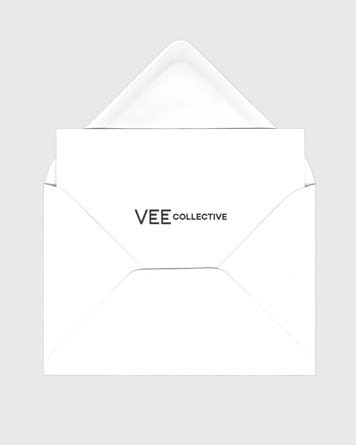 An open envelope with a branded card peeking out, showing the VEE Collective logo on the front.