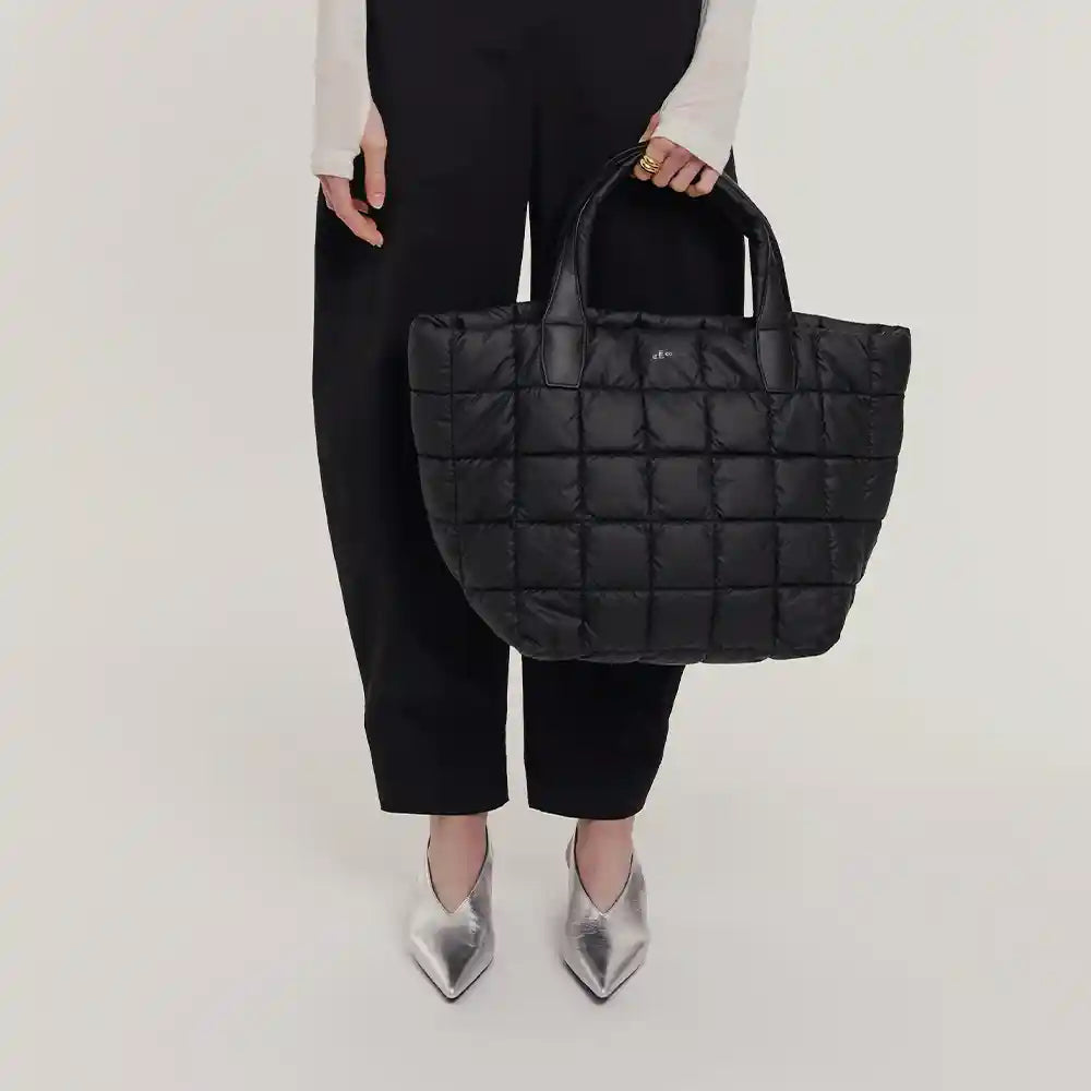 Lightweight tote bag perfect for moms, travel, everyday use, and gym. Versatile bag for various needs.