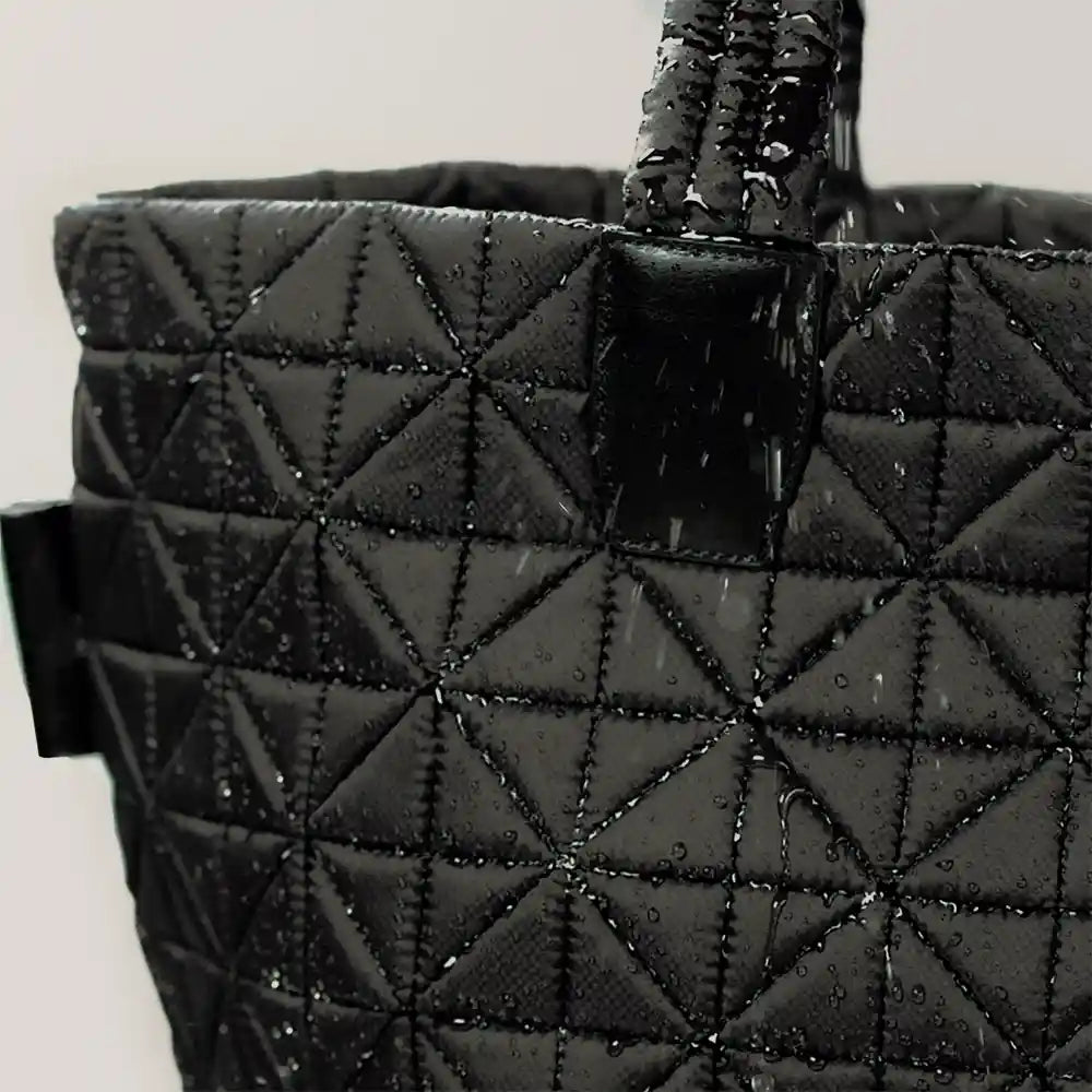 Water-repellent tote bag designed for everyday use and outdoor activities. Made from lightweight, sustainable fabric.