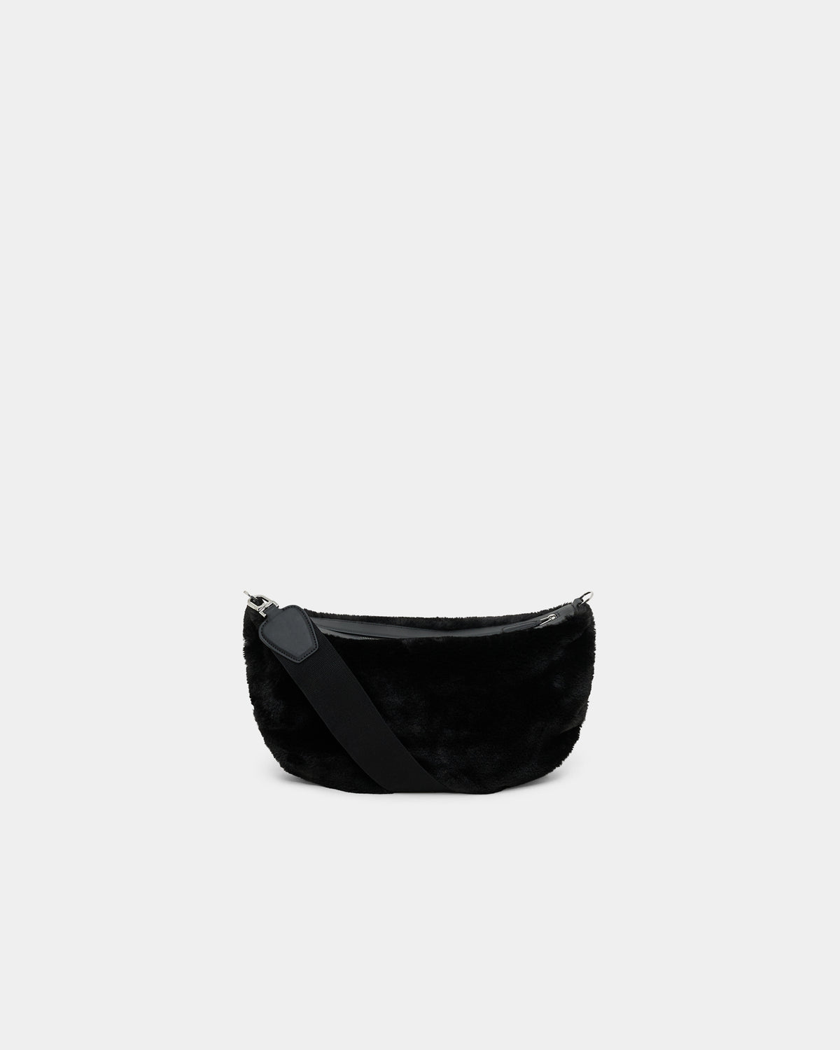 A clean product photo of a Caba Fur Banana Bag featuring a fuzzy faux-fur texture, set against a crisp white background.