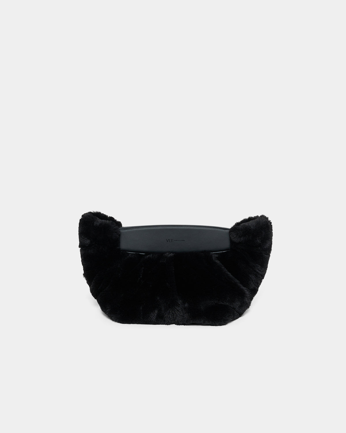 A clean front -view product photo of the Caba Fur Clutch, featuring a soft, fuzzy faux-fur texture against a crisp white background. 