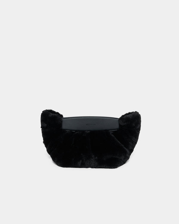 A clean front -view product photo of the Caba Fur Clutch, featuring a soft, fuzzy faux-fur texture against a crisp white background. 