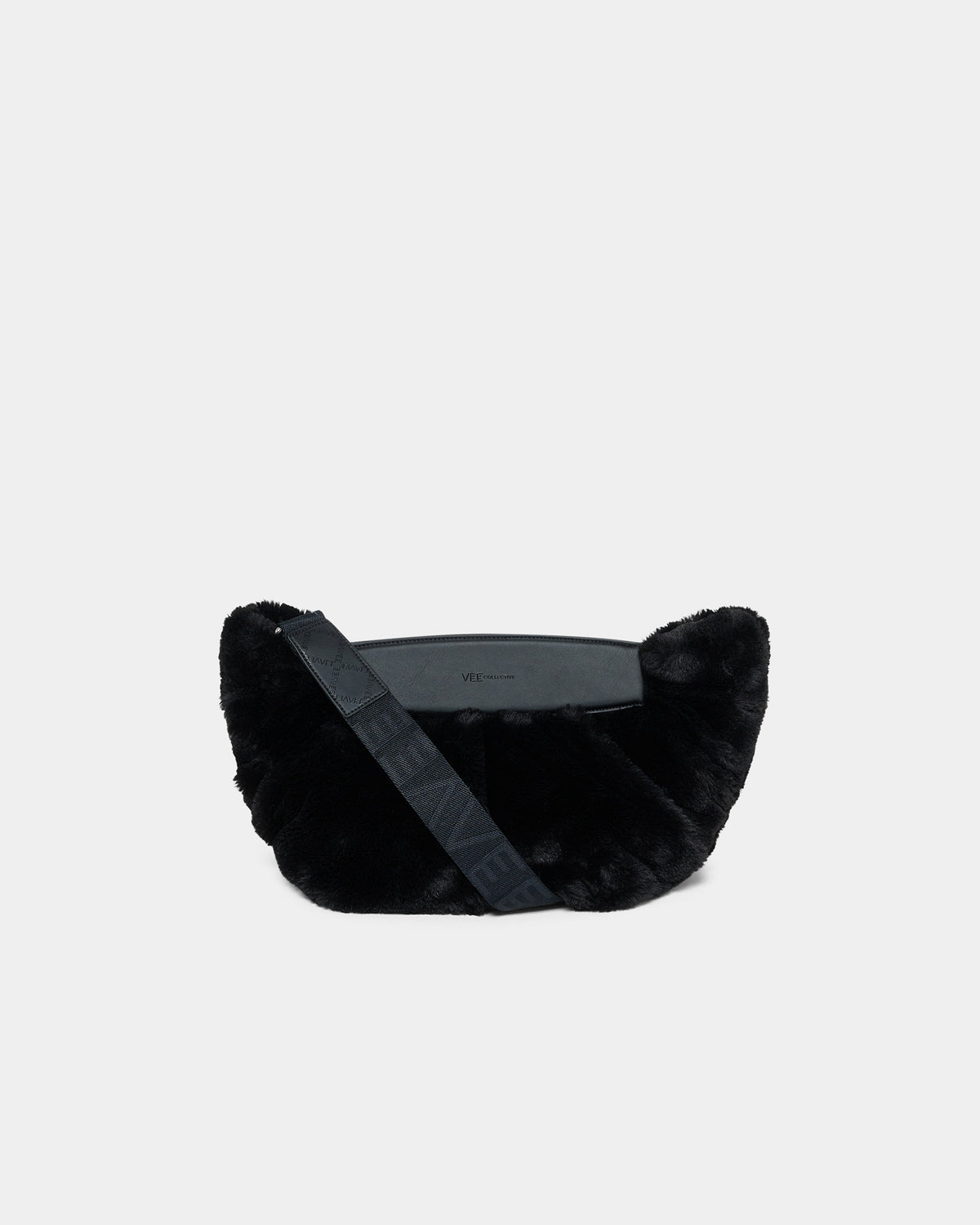 A clean front -view product photo of the Caba Fur Clutch, featuring a soft, fuzzy faux-fur texture and shoulder strap against a crisp white background.