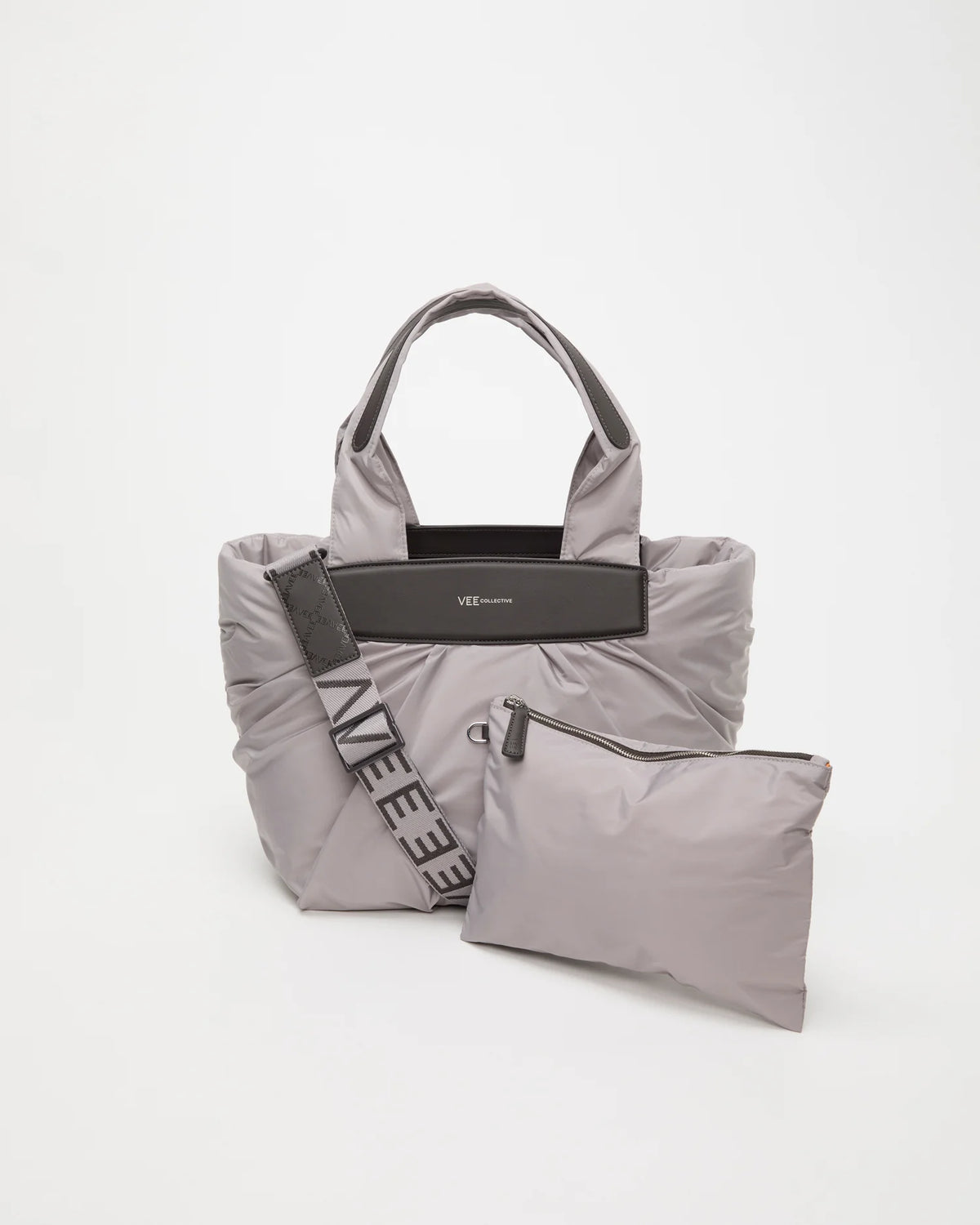 Front view of the Small Caba Tote Bag in Dove, shown with its matching pouch and detachable strap.