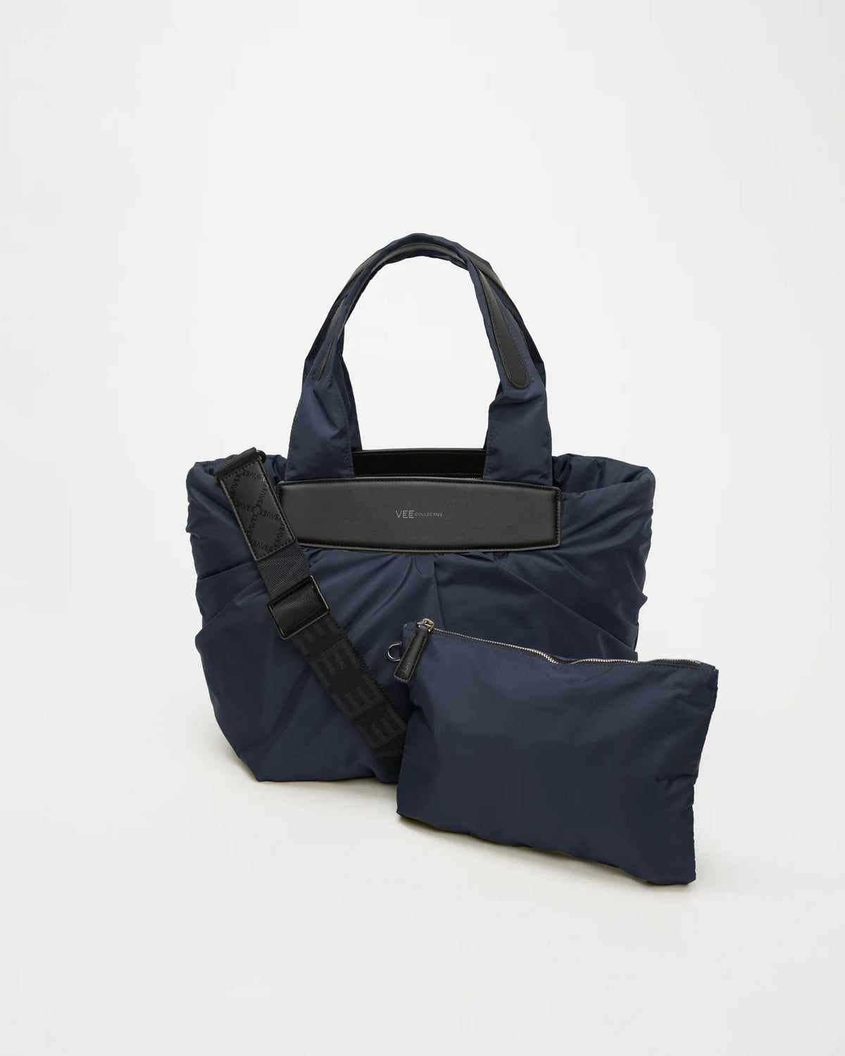 Front view of the Small Caba Tote Bag in Marine, shown with its matching pouch and detachable strap.