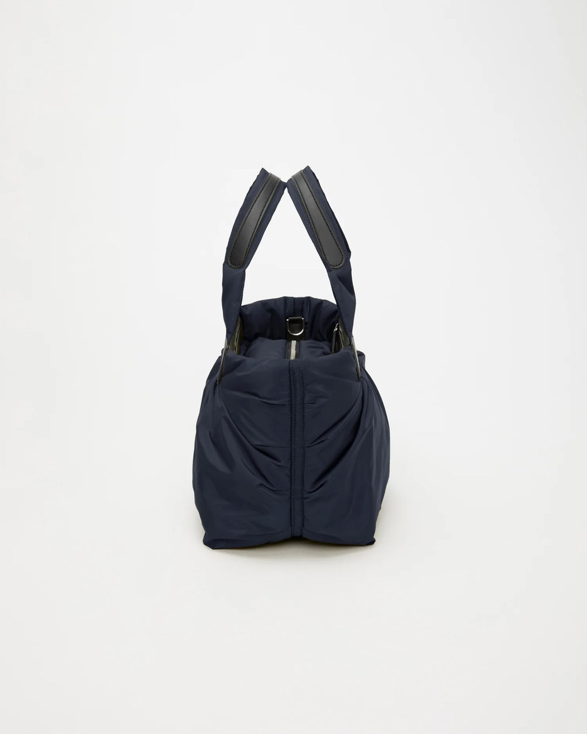 Side view product image of the Caba tote bag Small in Marine by Vee Collective.
