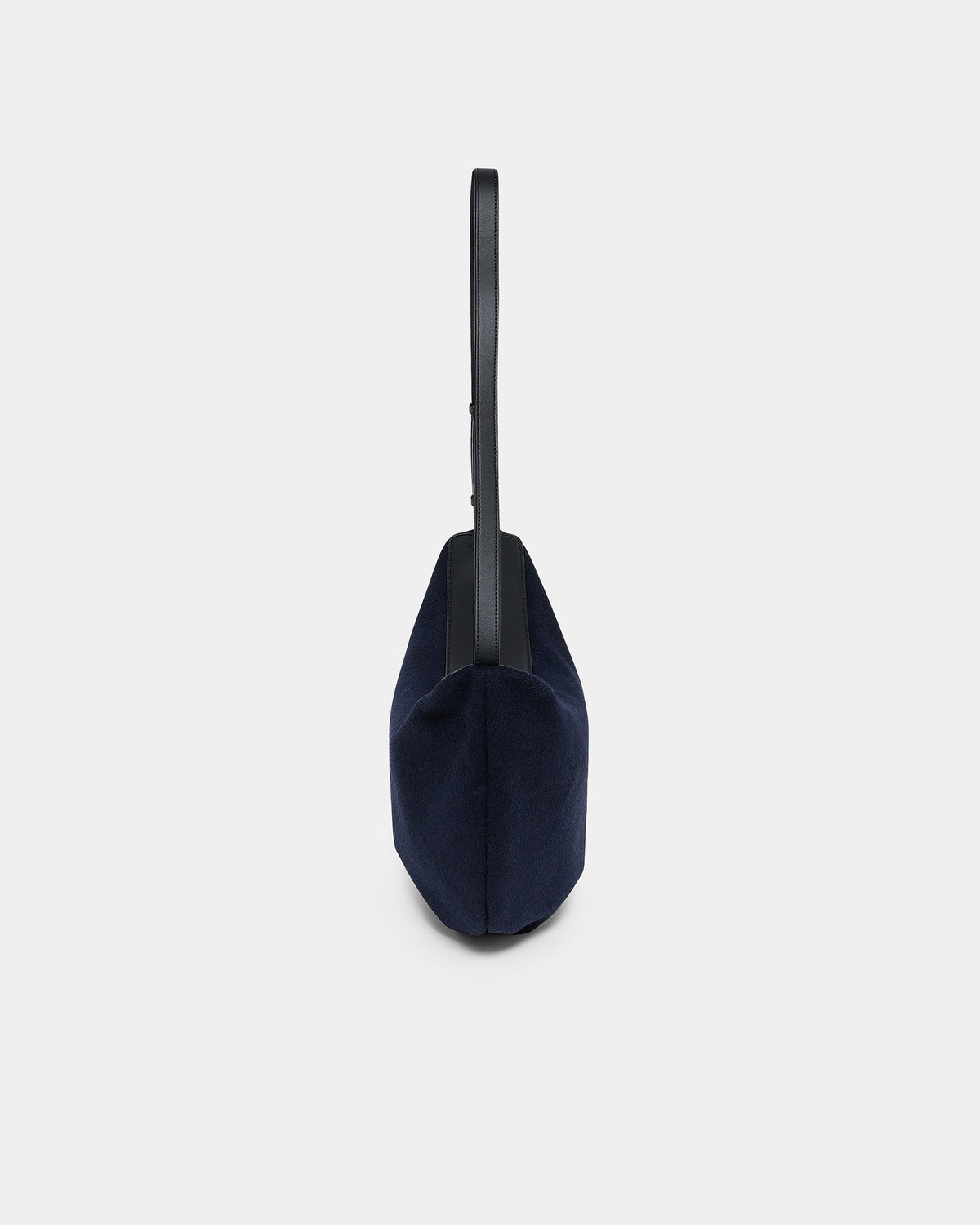 A product photo of the navy Essence Wool Banana bag shown from the side, featuring a zippered top and double shoulder straps, centered against a white background.