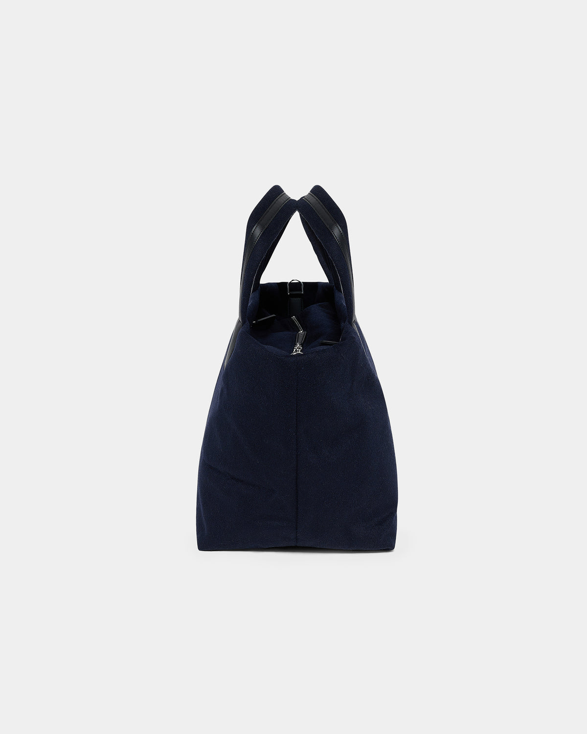 A product photo of the Essence Wool Tote bag shown from the side, featuring a zippered top and double shoulder straps, centered against a white background.