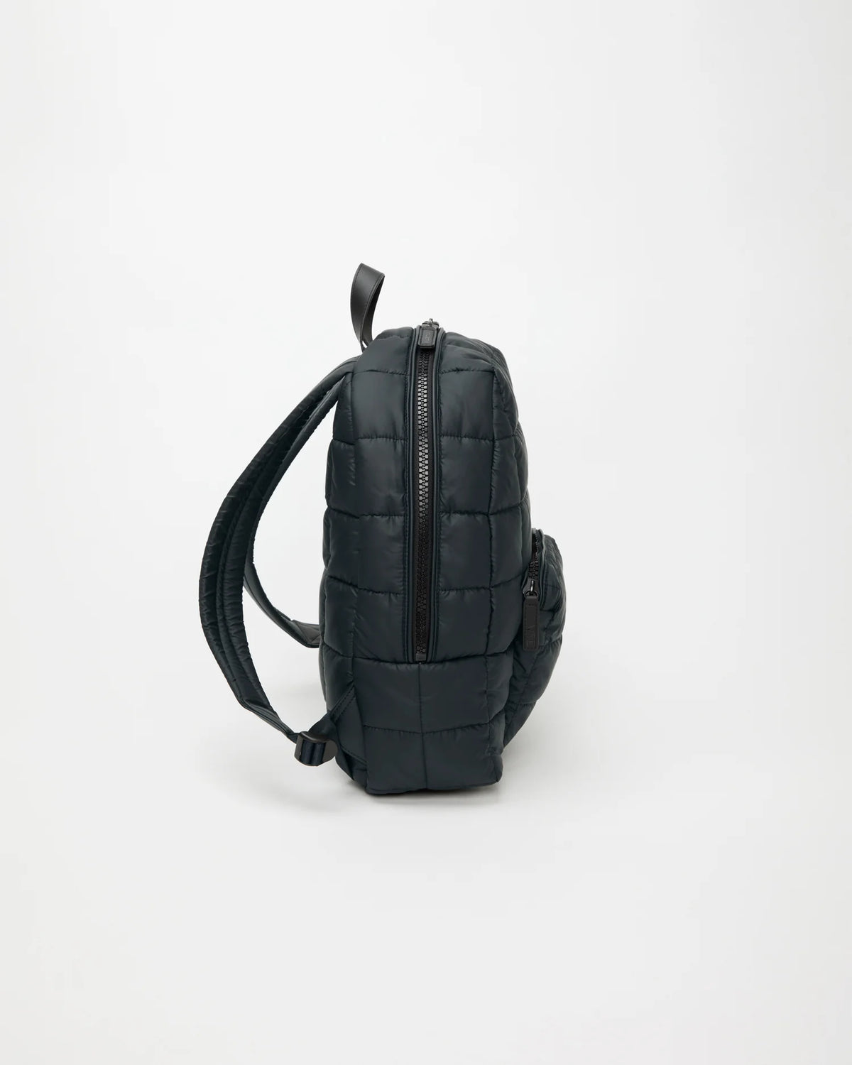 Side view product image of the Porter Backpack in Dark Navy by Vee Collective.
