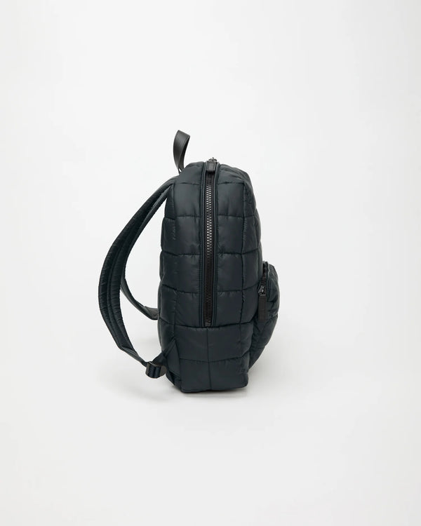 Side view product image of the Porter Backpack in Dark Navy by Vee Collective.