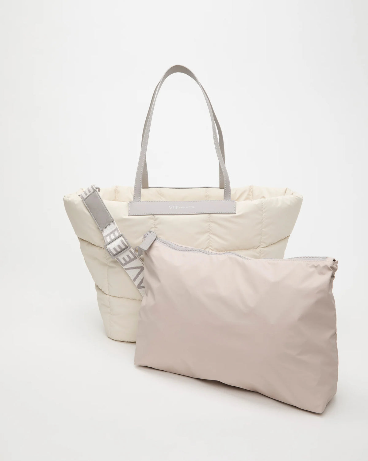 Front view of the Porter Marché Large Tote Bag in Barely Beige, shown with its matching pouch and detachable strap.