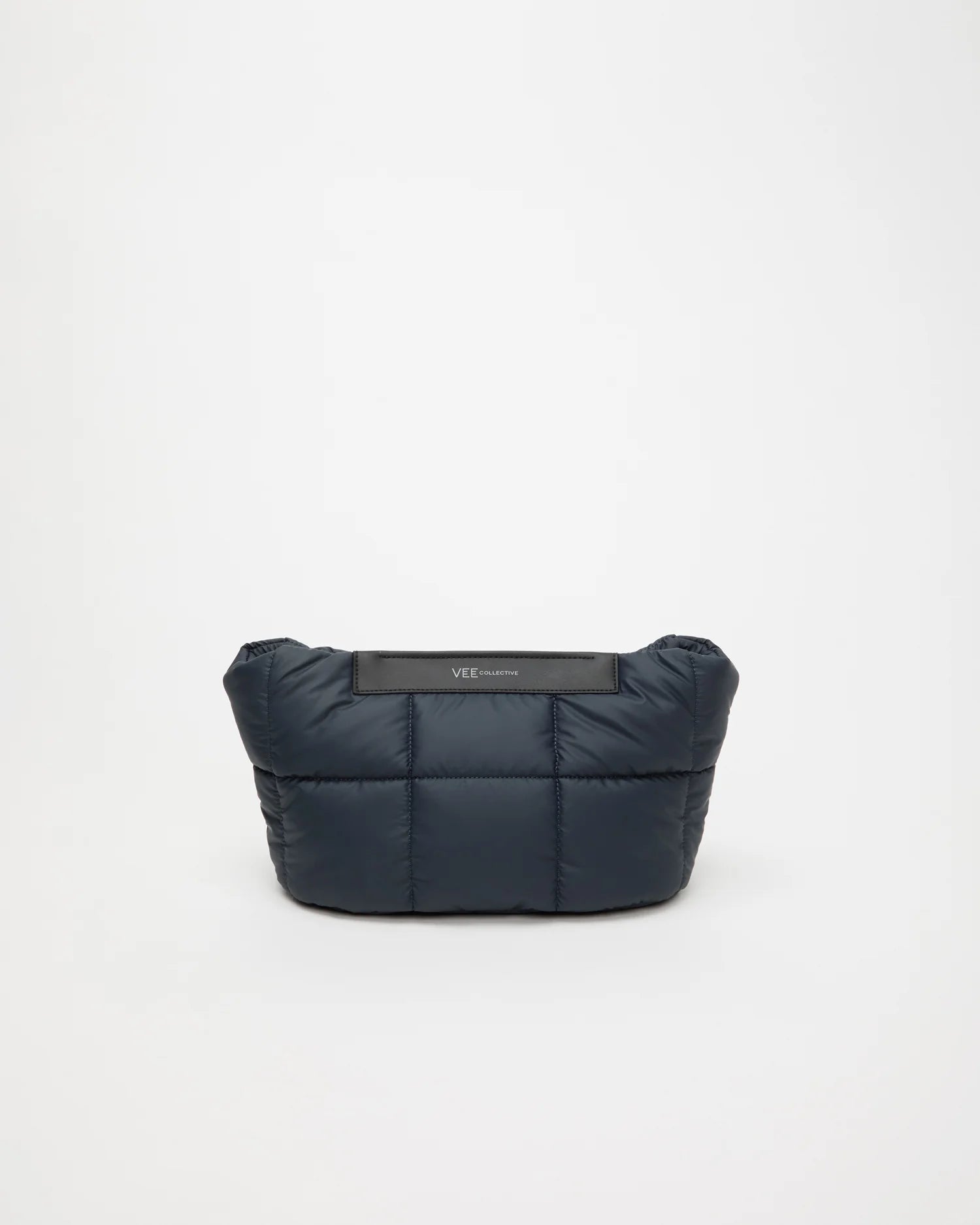Front Image of the Porter Basque Clutch Bag in Dark Navy by Vee Collective.
