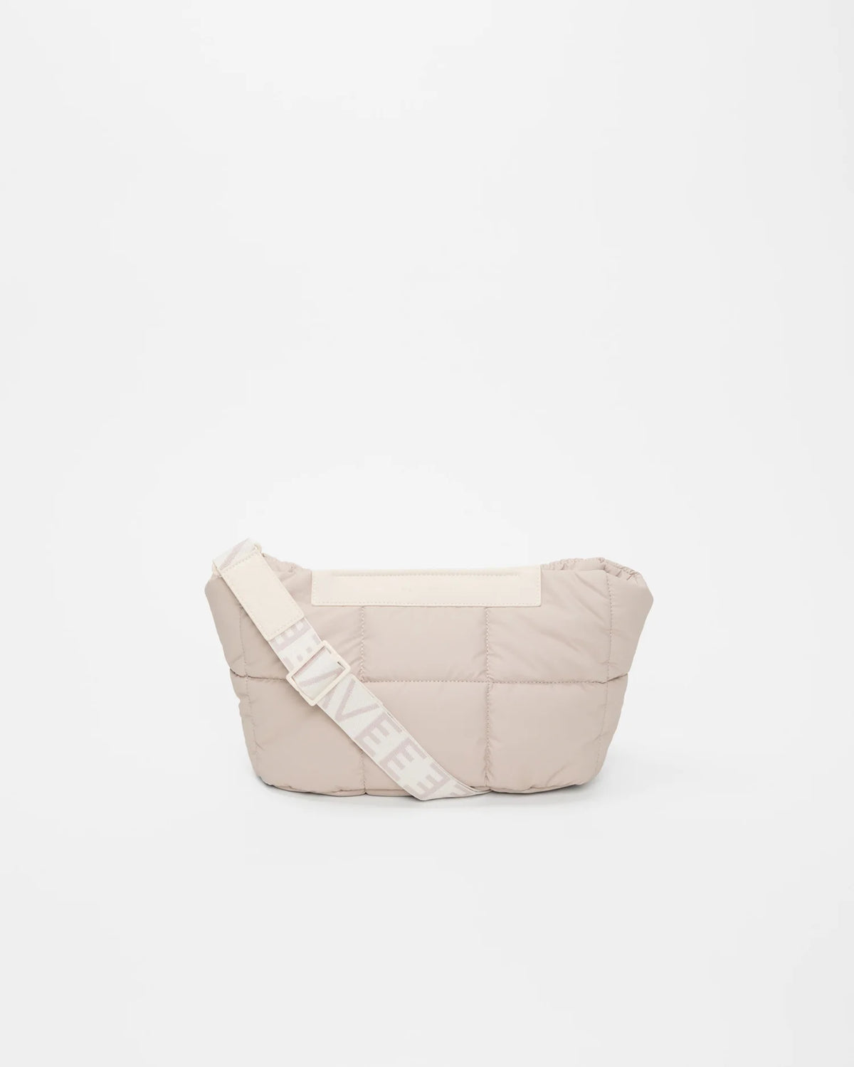 Front Image of the Porter Basque Clutch Bag in Soft Taupe by Vee Collective, displayed with its strap.