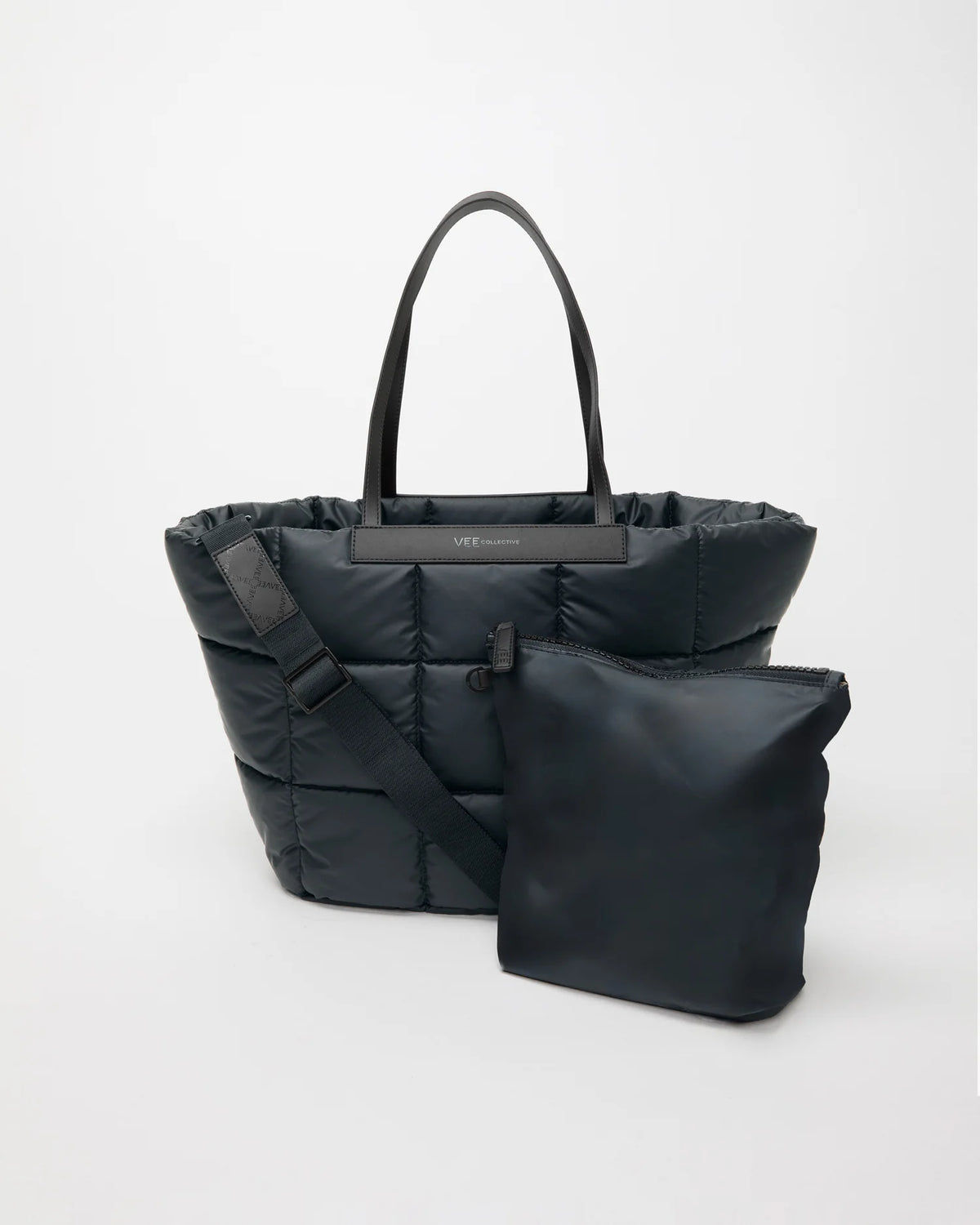 Front view of the Porter Basque Tote Bag in Dark Navy, shown with its matching pouch and detachable strap.