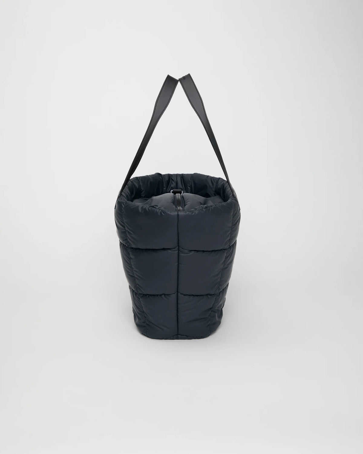Side view product image of the Porter Basque tote bag in Dark Navy by Vee Collective.