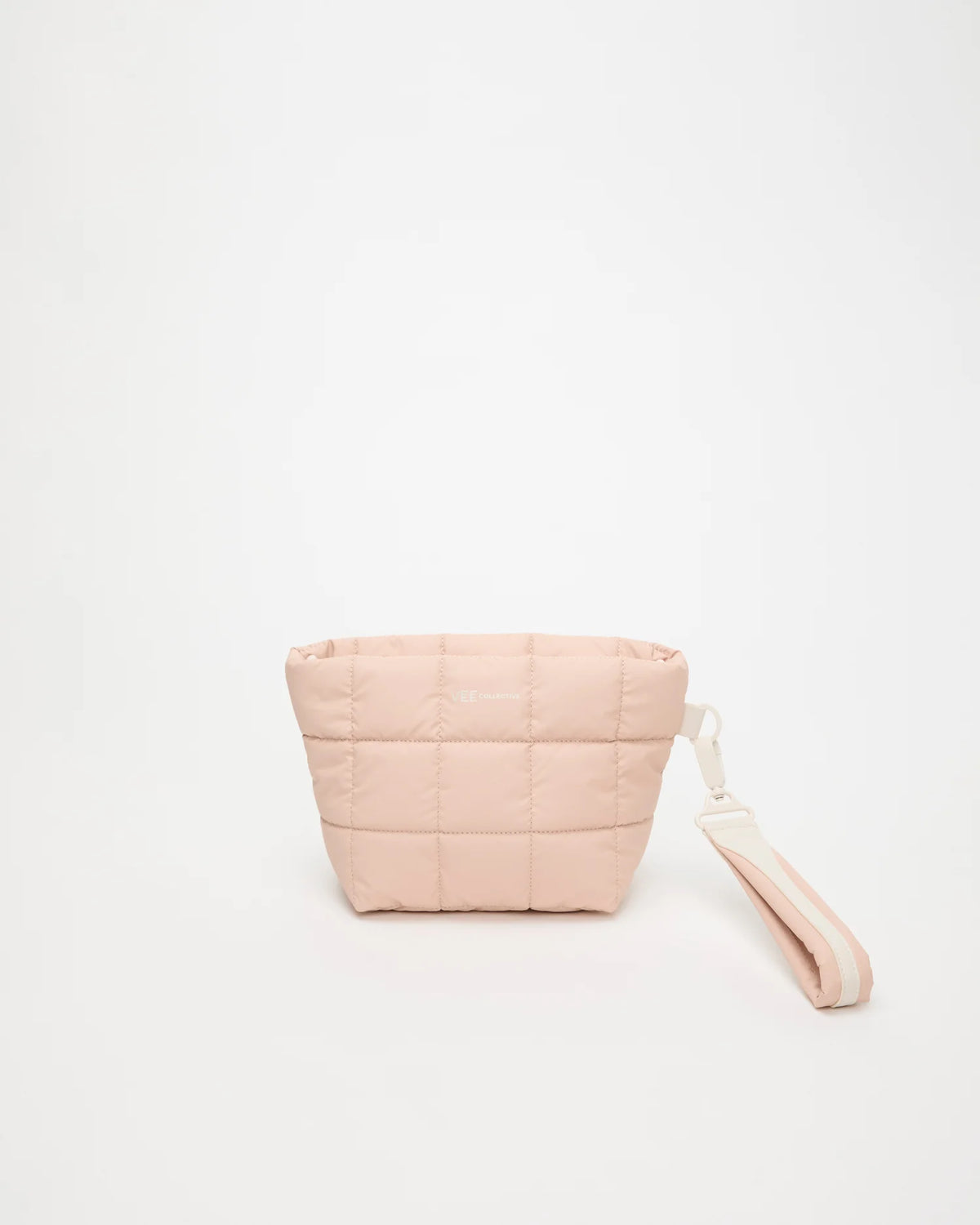 Front view of the Porter Clutch Bag in Cameo Rose by Vee Collective, shown with the attachable wristlet.