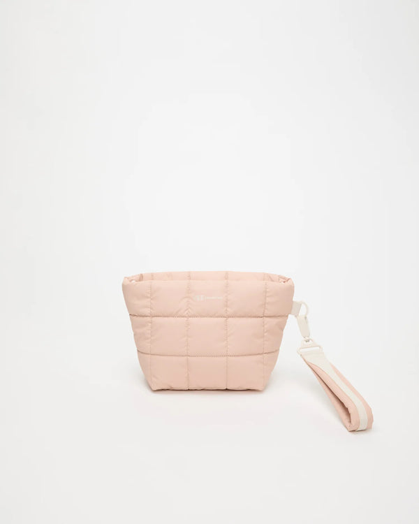 Front view of the Porter Clutch Bag in Cameo Rose by Vee Collective, shown with the attachable wristlet.