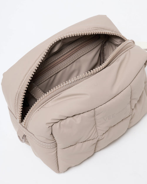 Open Porter Cosmetics Pouch Medium Mocha Meringue showing interior zip pockets and padded exterior