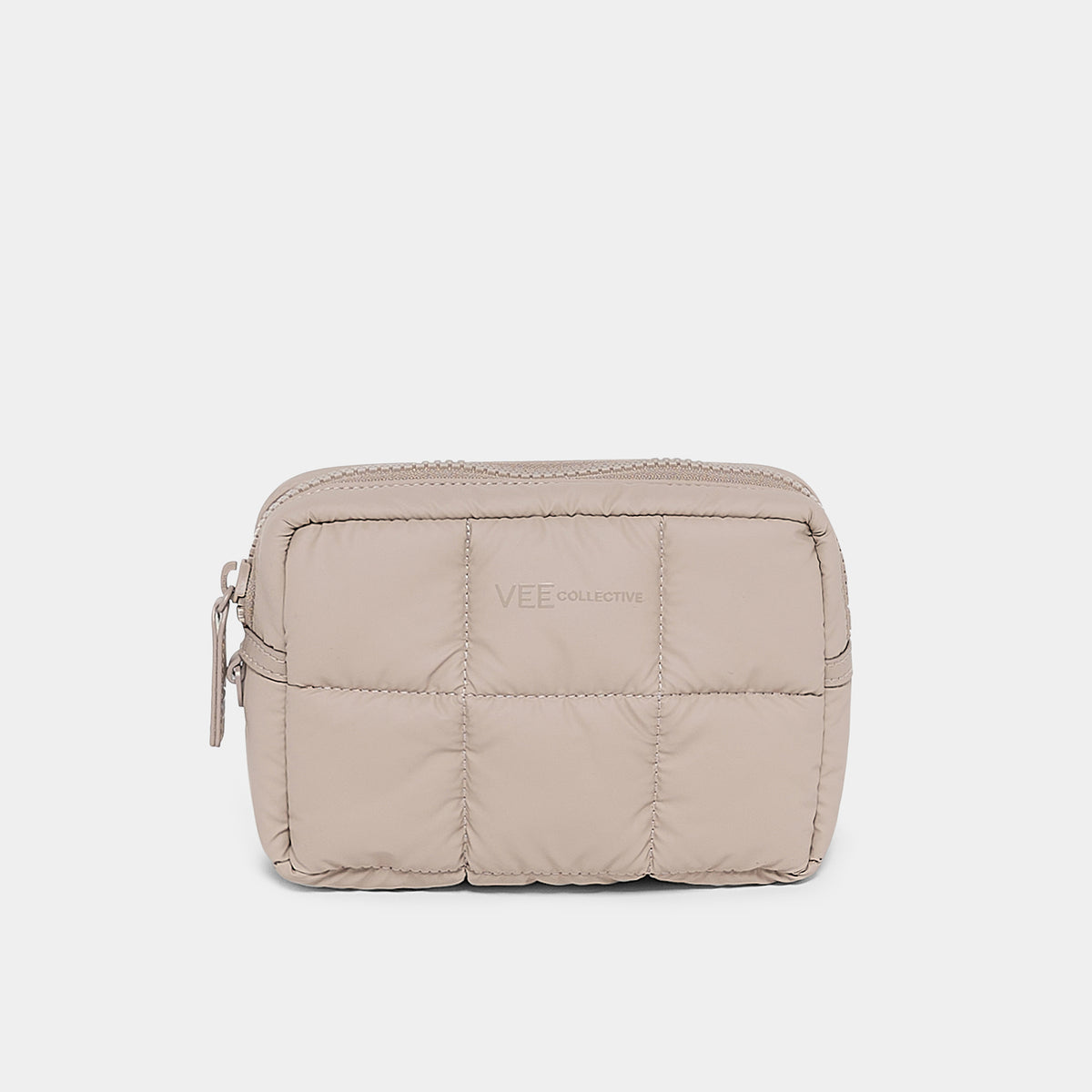 Close-up of beige quilted Organizer Duo top with zipper and subtle branding