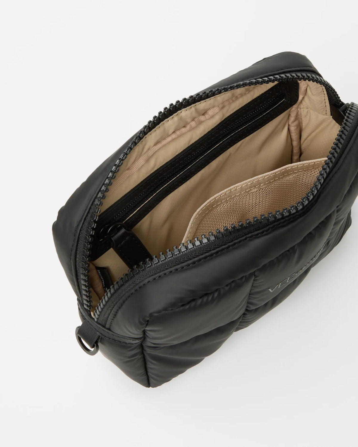 Product photo of the Porter Cosmetics Pouch Small in matt black, shown slightly angled with the lid open to reveal its brown interior lining.
