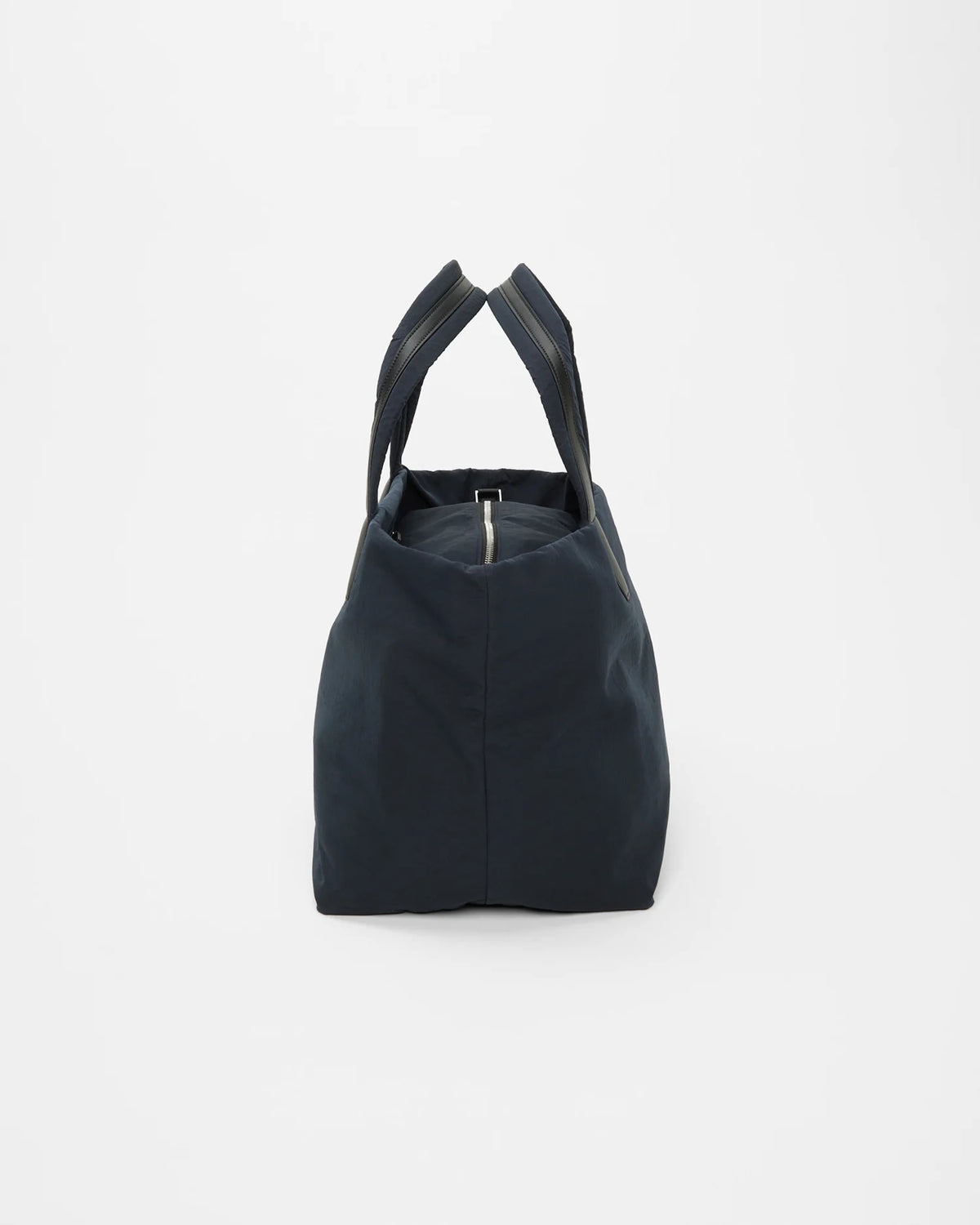 Side view product image of the Porter Essence Medium tote bag in Midnight Trench by Vee Collective.