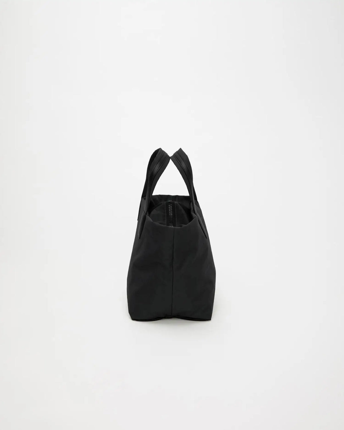 Porter Essence Small Black Paper bag made from sustainable paper touch nylon with refined minimalistic design.