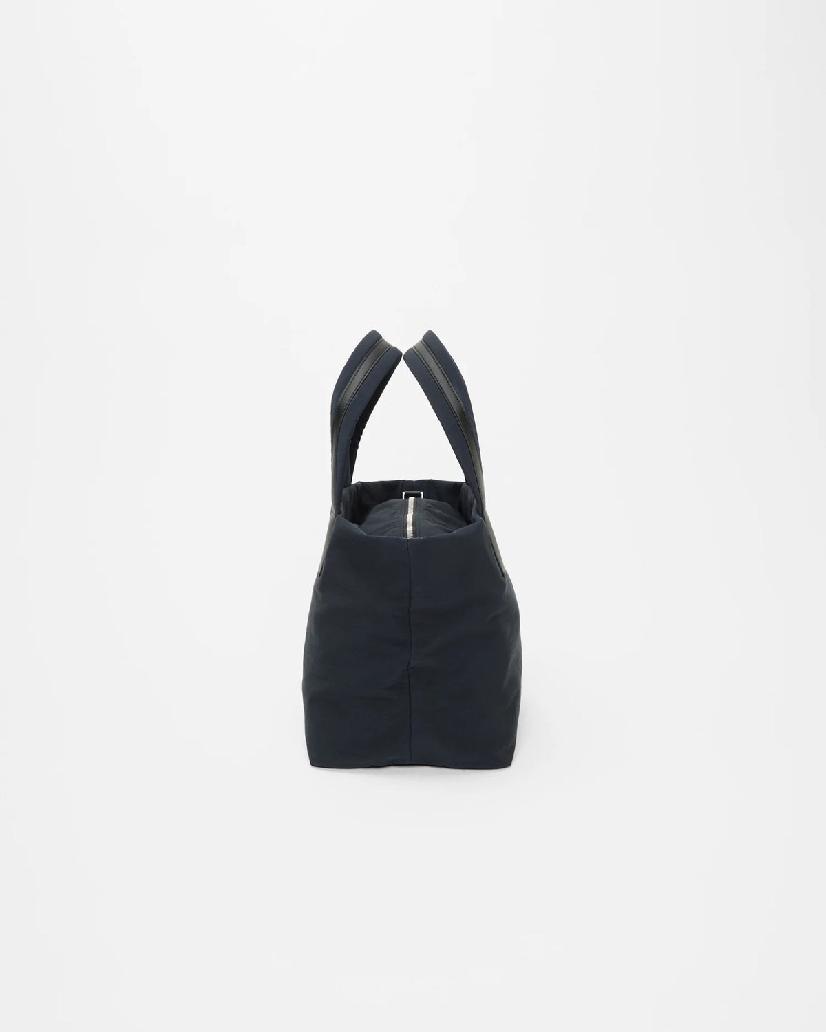 Side view product image of the Porter Essence Small tote bag in Midnight Trench by Vee Collective.