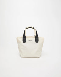 Front view product image of the Vee Collective Porter Essence Small Tote Bag in off-white, showing the clean, structured tote silhouette and minimal detailing.