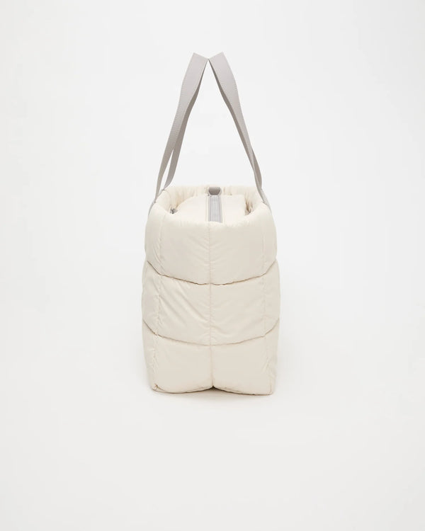 Side view product image of the Porter Marché Large tote bag in Barely Beige by Vee Collective.