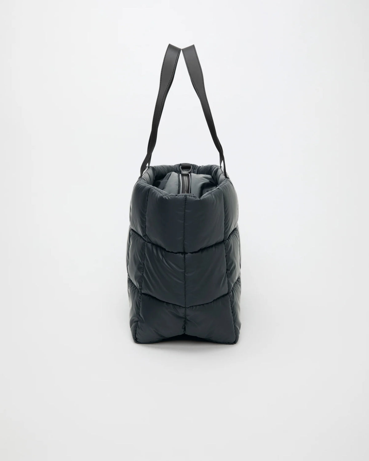 Side view product image of the Porter Marché Large tote bag in Dark Navy by Vee Collective.