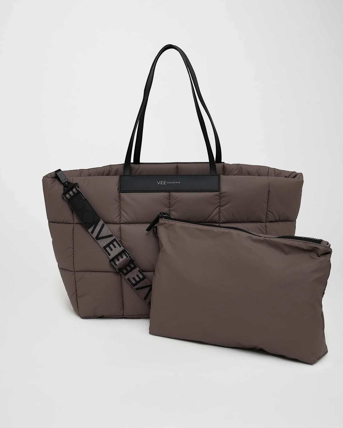 A picture featuring a Porter Marche Bag medium in mink with a matching shoulder strap, shown next to a matching zippered pouch on a white background.