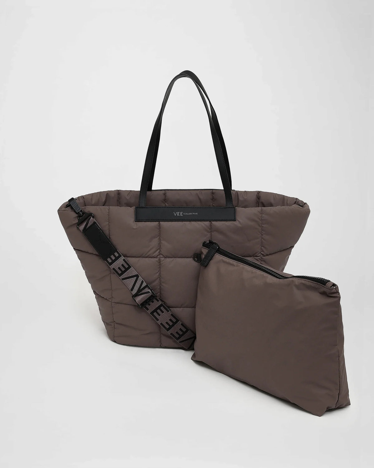 A picture featuring a Porter Marche Bag medium in mink with a matching shoulder strap, shown next to a matching zippered pouch on a white background.