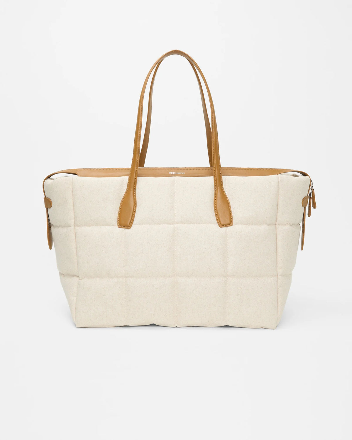 Tela Tote large natural tan canvas with tan leather handles on a white background