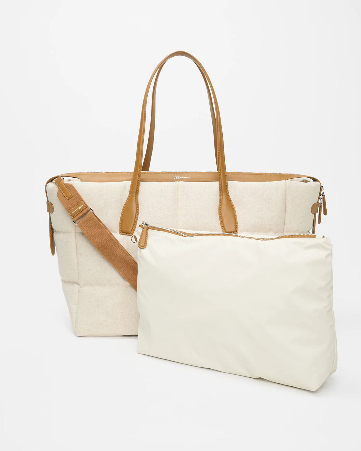 Tela Tote large natural canvas bag with tan leather handles and top zipper