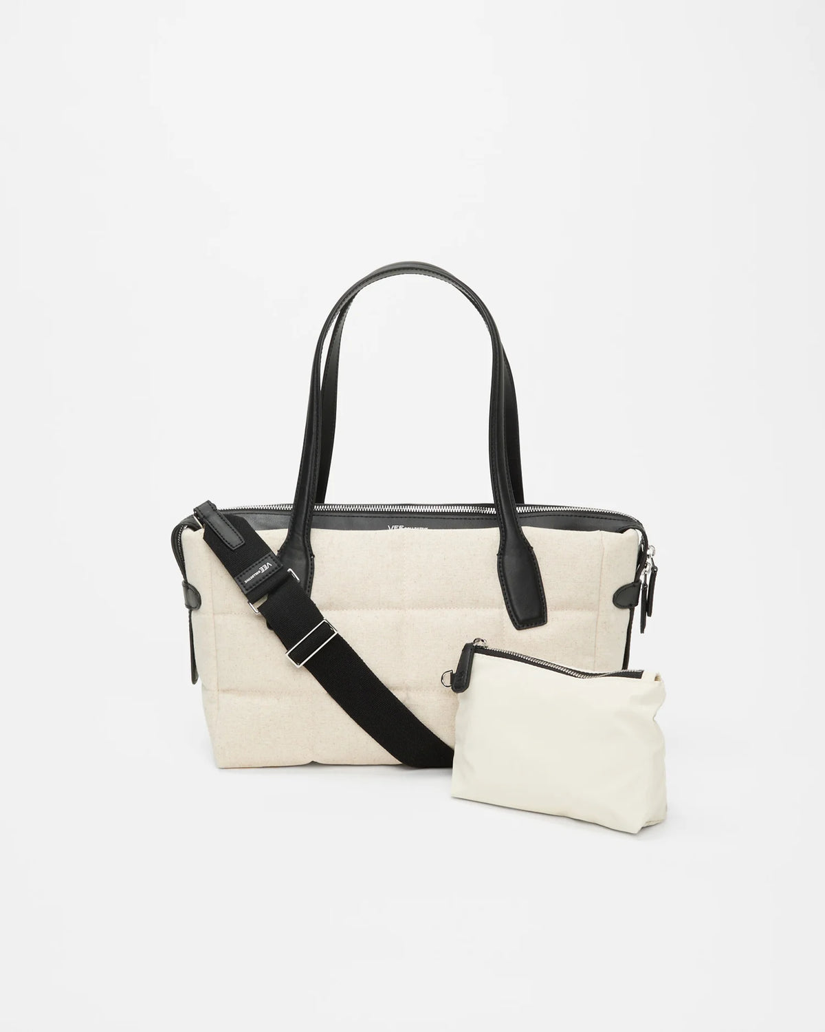 Tela Tote Small natural canvas with black leather handles and a detachable shoulder strap