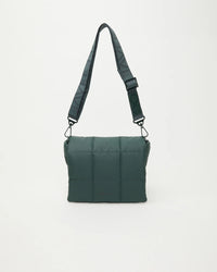 Front view of the Porter Messenger Crossbody Bag by Vee Collective in Bottle Green.