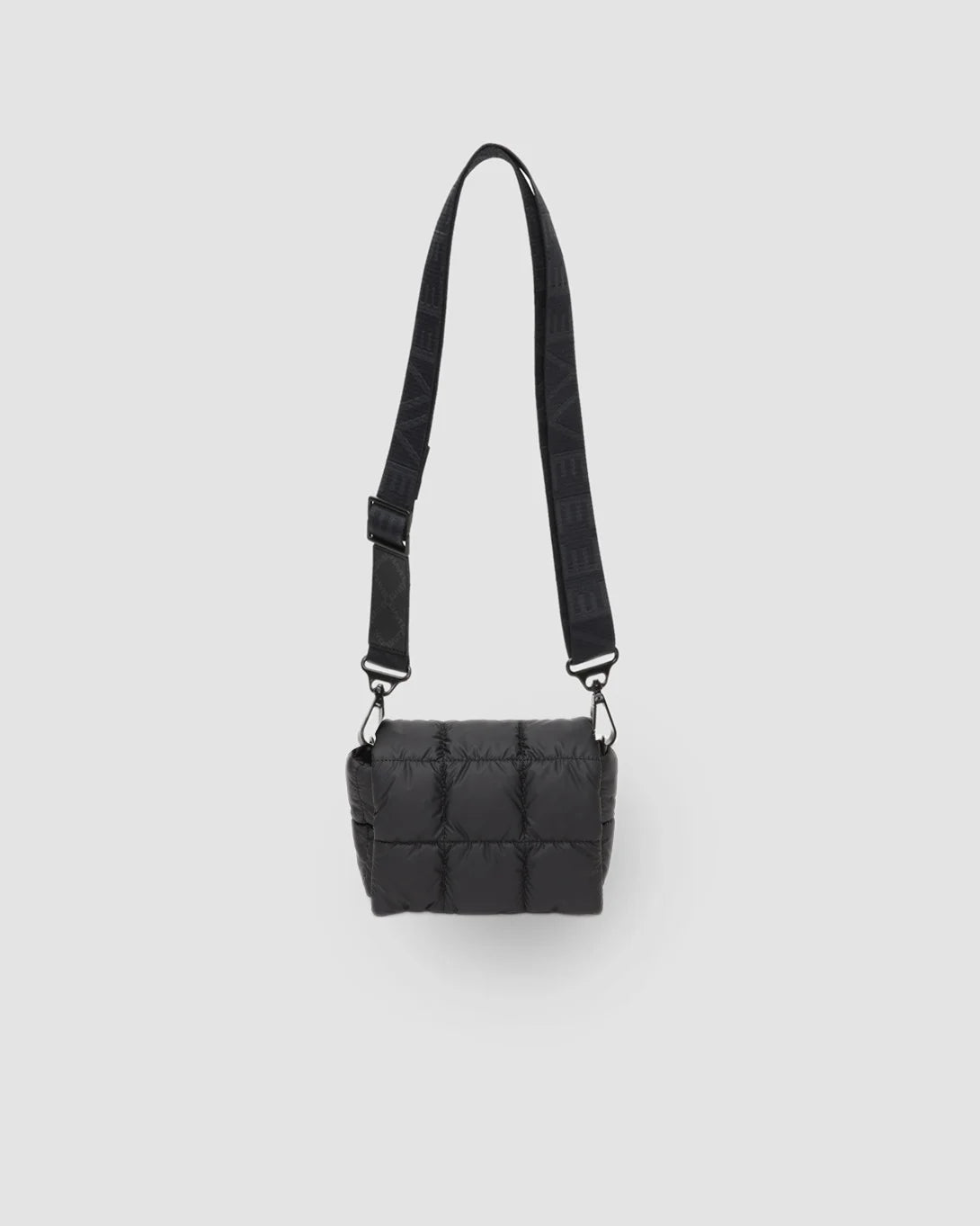 Porter Messenger Mini in matte black with quilted exterior and adjustable strap