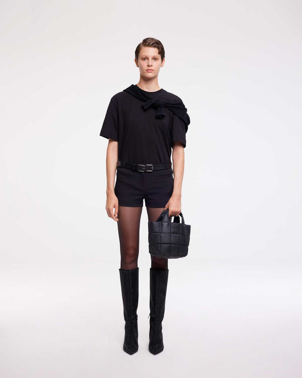 Mini handbag made from sustainable, waterproof materials, perfect for everyday use, concerts, and nights out. Stylish and practical, combining eco-friendly design with durability for versatile occasions."
