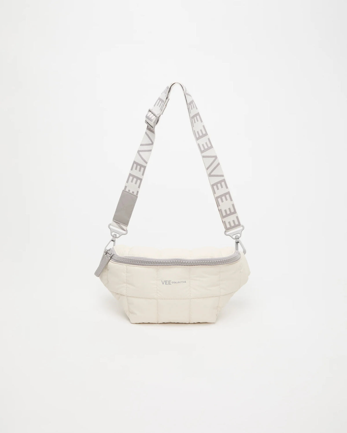 Front view of the Porter Sling Bag in Barely Beige by Vee Collective, displayed with its strap.
