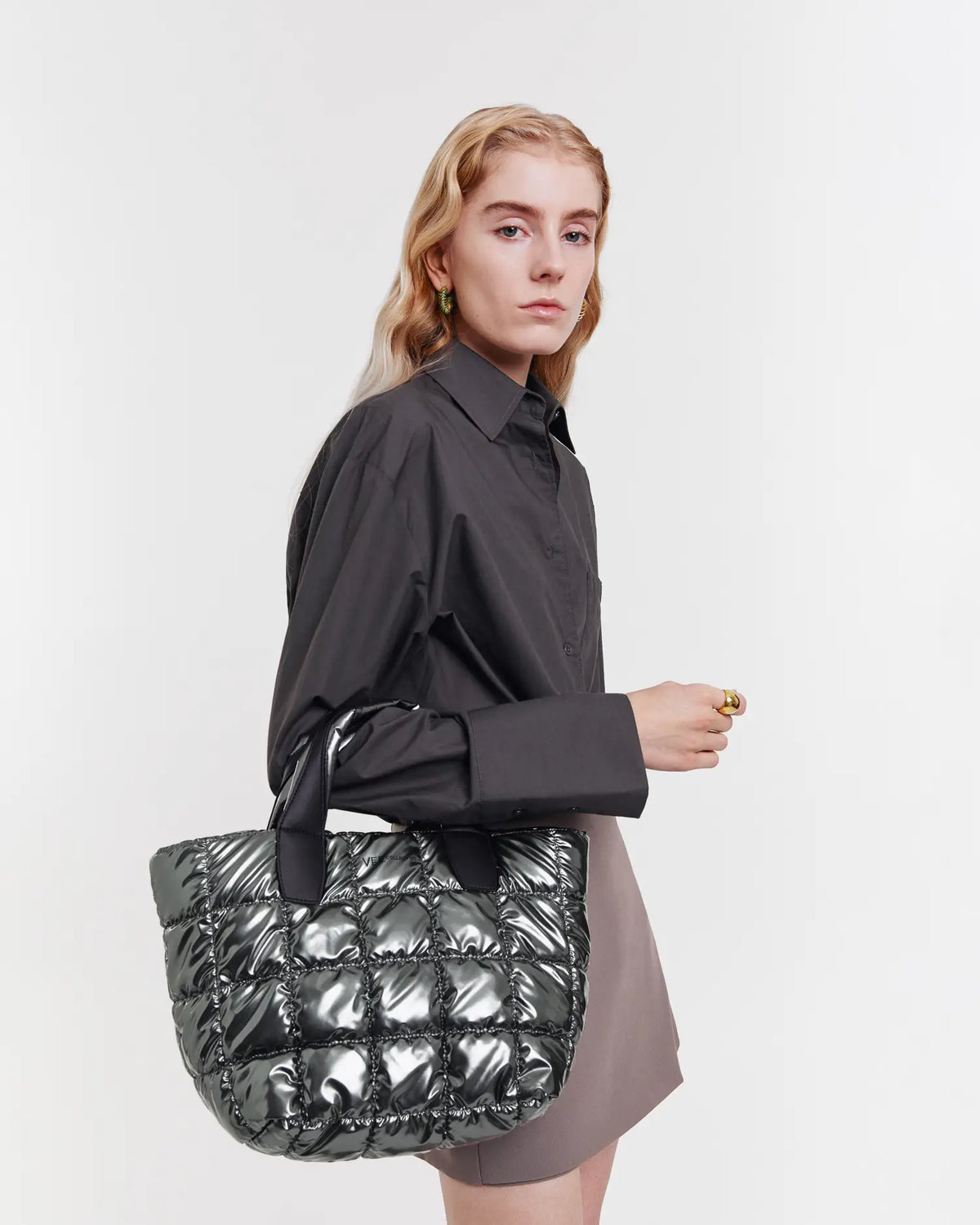 Compact small tote bag crafted from sustainable and waterproof materials, designed for everyday use and work. Perfectly sized to carry essentials while maintaining a sleek, practical style. Combines eco-friendly durability with versatile functionality for both professional and casual settings."