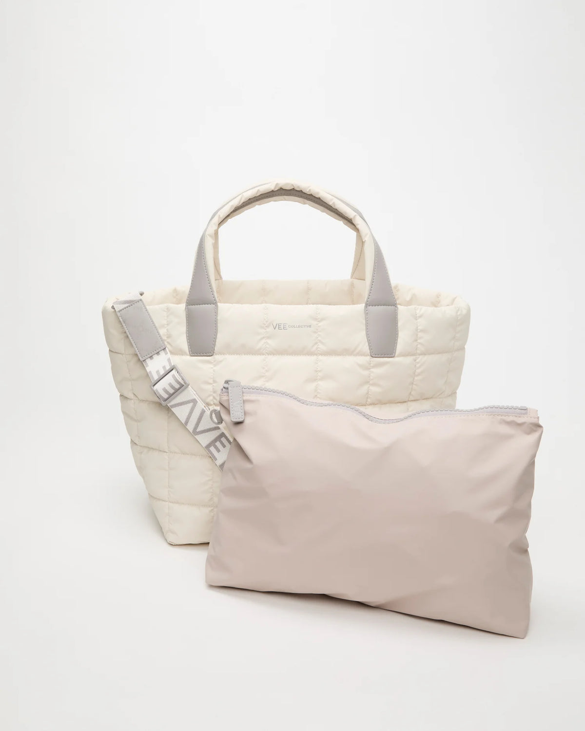 Front view of the Porter Tote Bag Medium in Barely Beige, shown with its matching pouch and detachable strap.