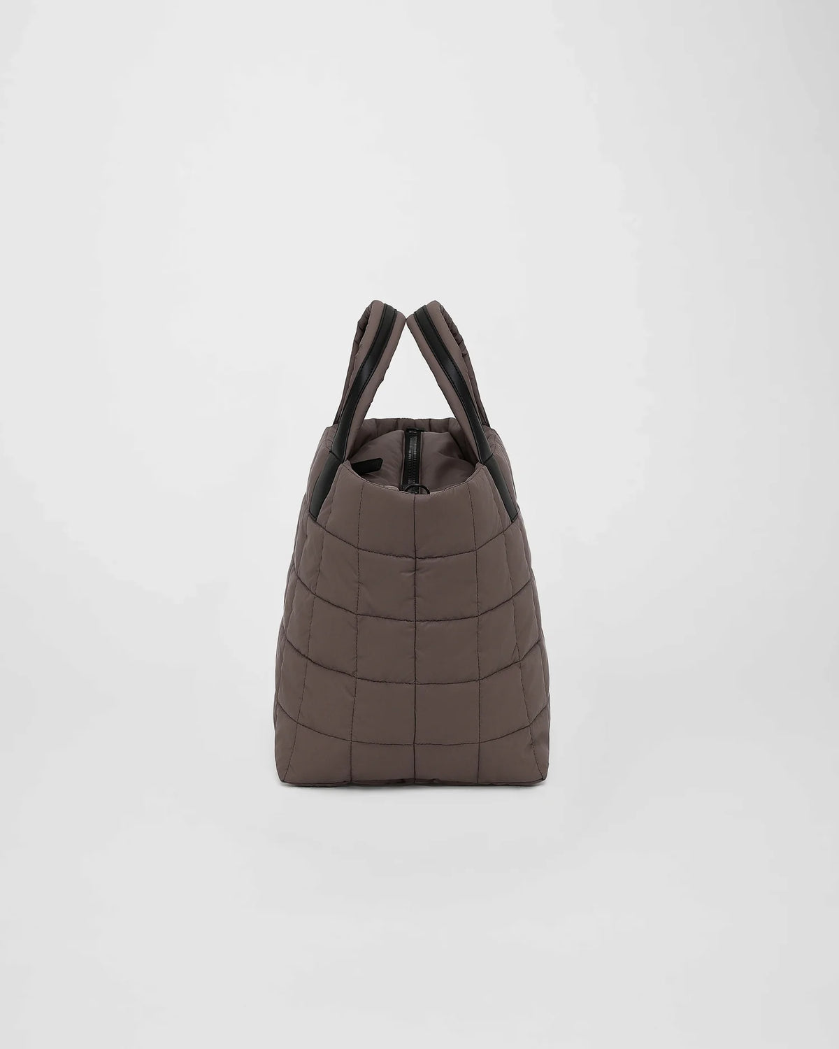 A three-quarter view of a mink Porter Weekender bag displayed against a white background.