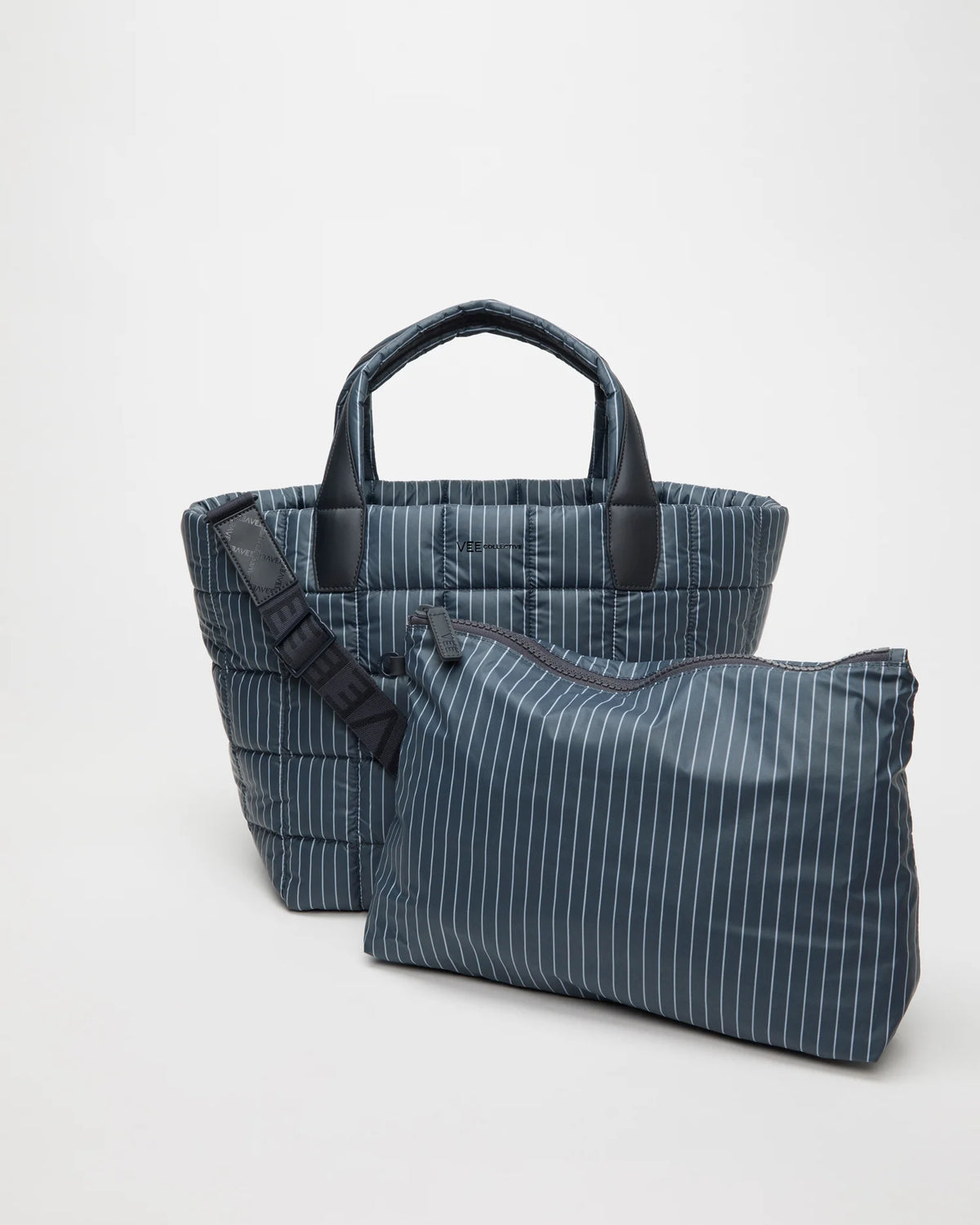 Front view of the Porter Tote Bag Medium in Pinstripe, shown with its matching pouch and detachable strap.