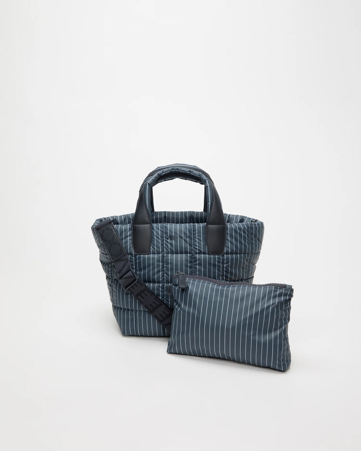 Front view of the Porter Tote Bag Small in Pinstripe, shown with its matching pouch and detachable strap.