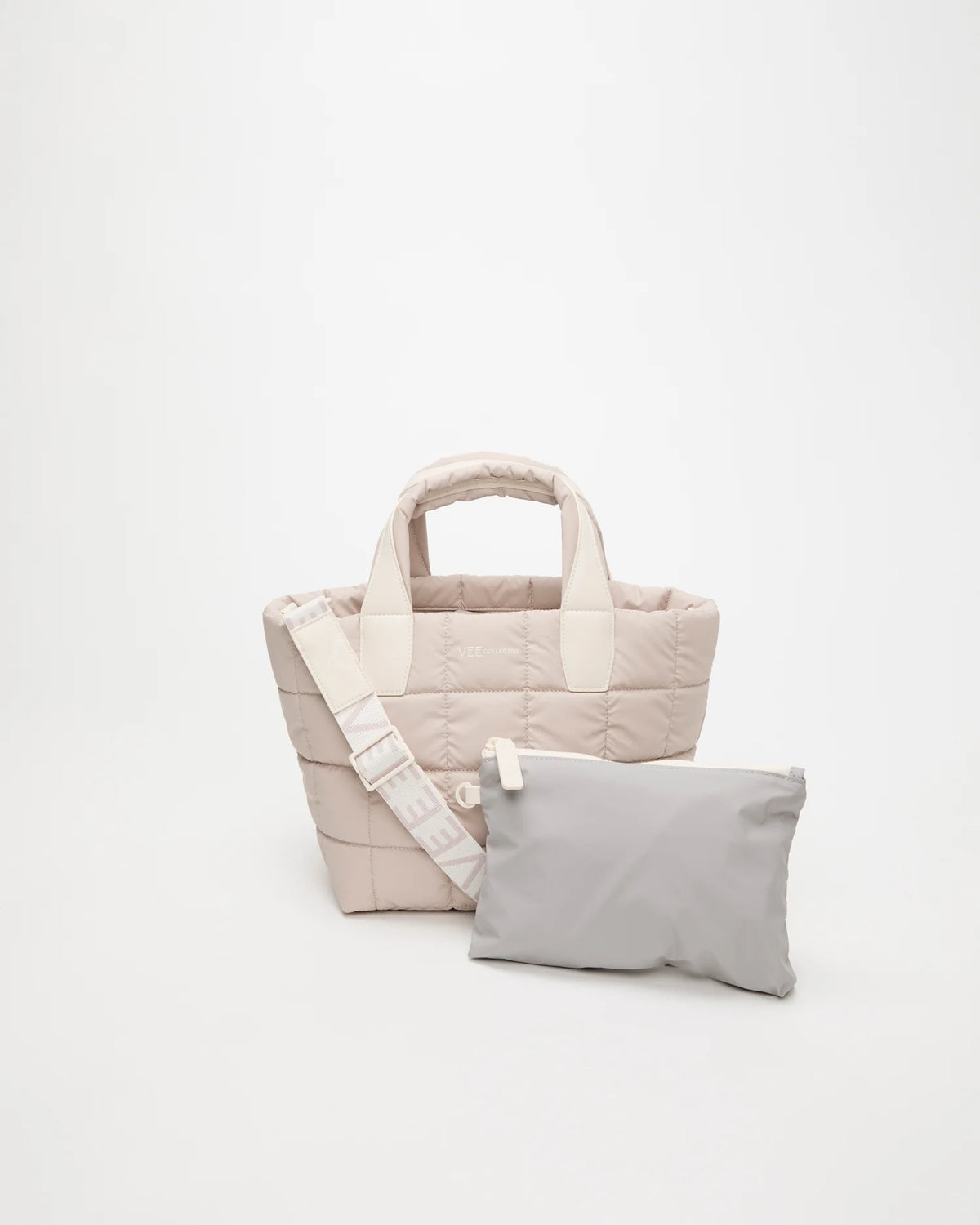Front view of the Porter Tote Bag Small in Soft Taupe, shown with its matching pouch and detachable strap.